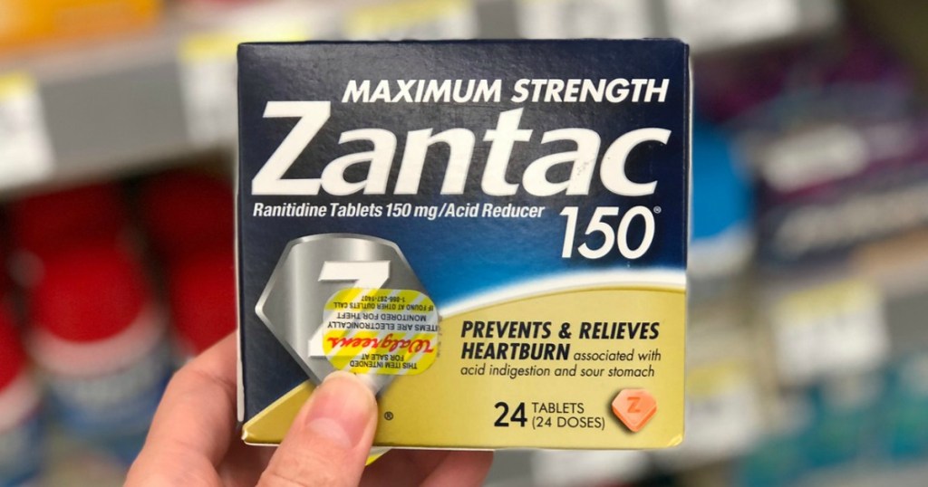 hand holding zantac 150 tablets at walgreens