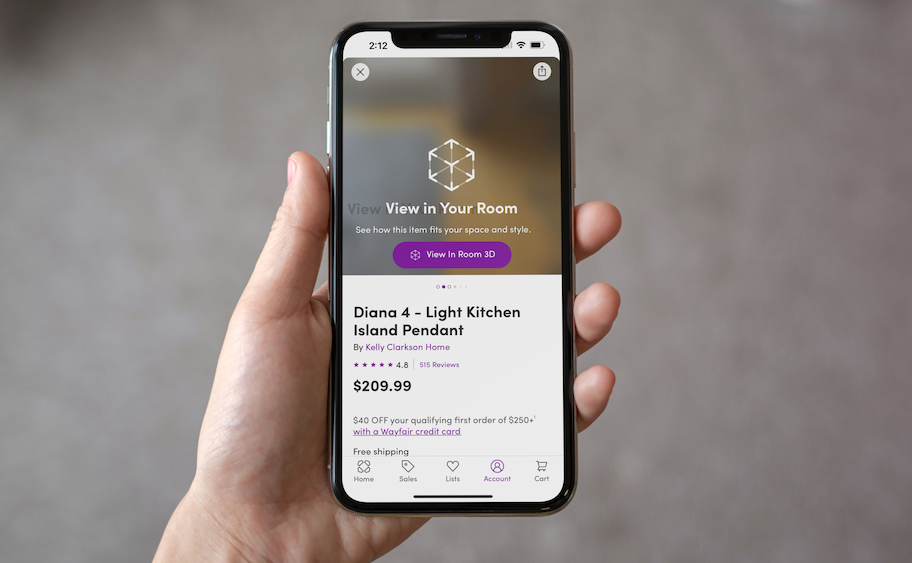 hand holding phone with wayfair view in your room feature