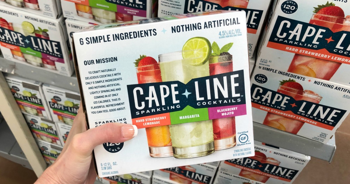 Woman holding Cape Line Sparkling Cocktails in Walmart store
