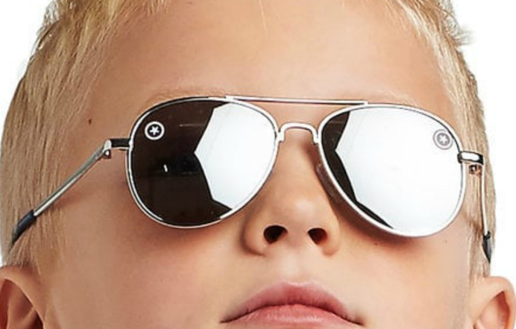 Boy wearing reflective glases