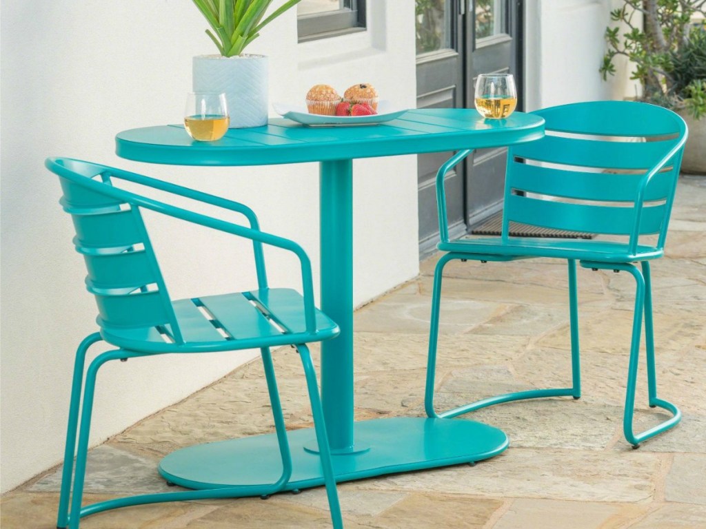 Christopher Knight Iron Bistro set on stone patio