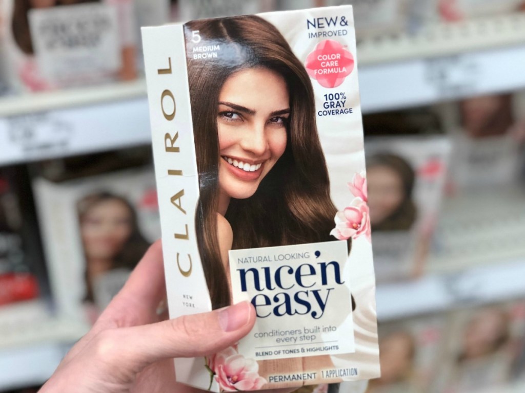 Woman's holding Clairol Nice N' Easy Hair Color