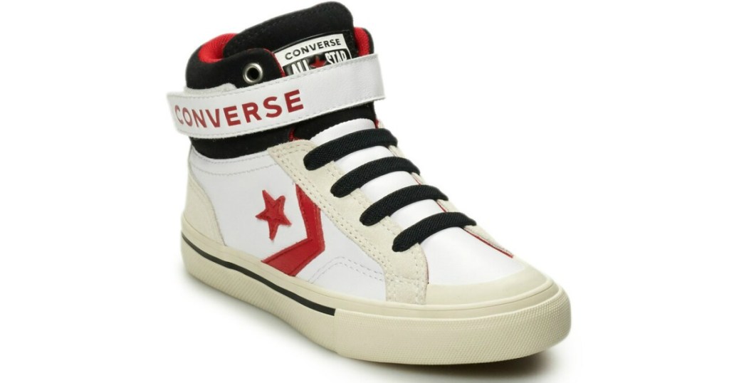 boy's white converse hightops with star and arrow