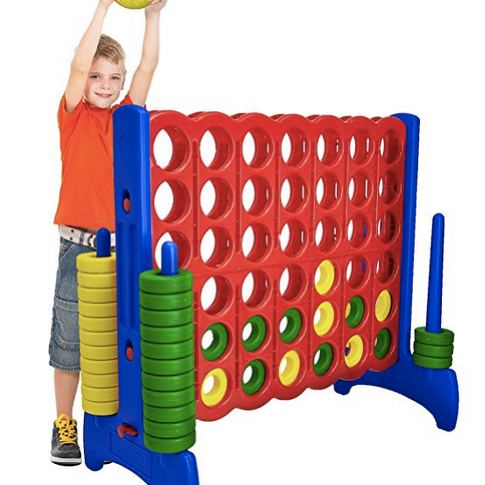 Boy playing Giantville 4 in a Row Connect Game