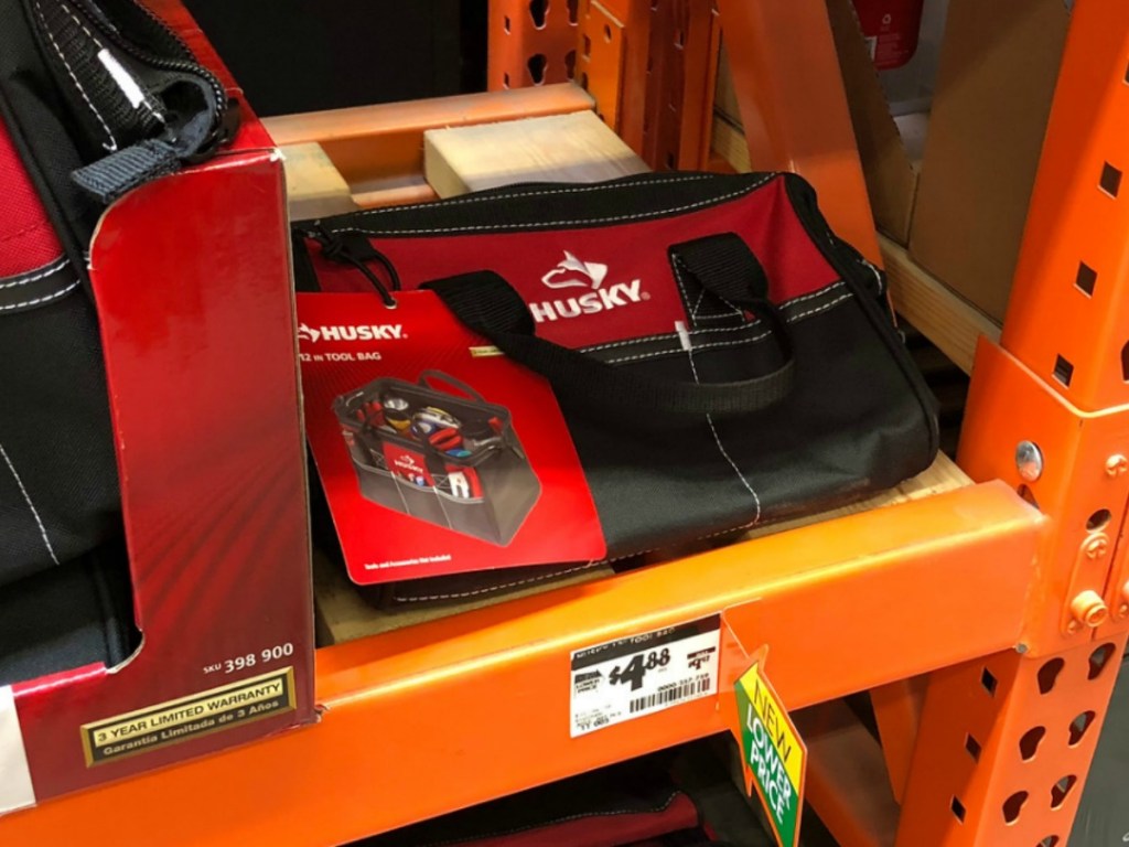 Red and black tool bag unfolded on store shelf