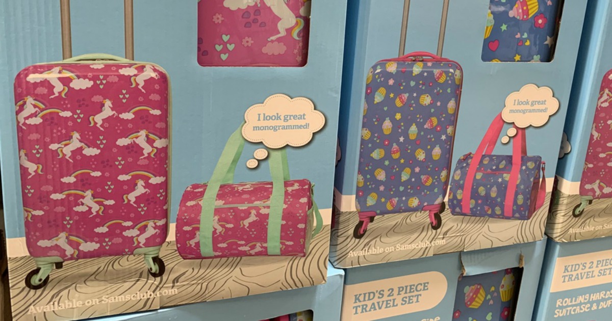 kids unicorn and cupcake luggage on display at store