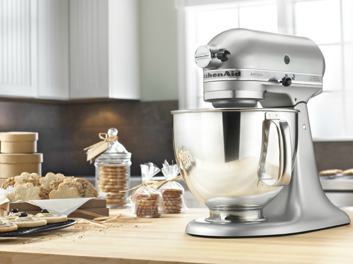 KitchenAid Mixer Artisan on counter with baked goods