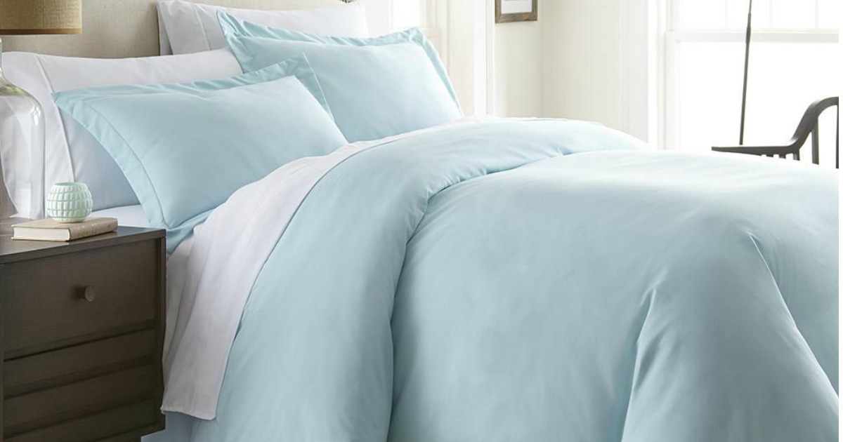 Queen bed featuring light blue Linens & Hutch Duvet Cover Set