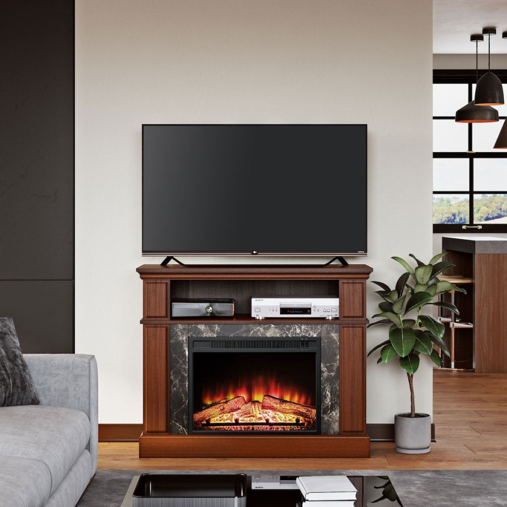 living room image of Mainstays Loring Media Fireplace with tv on top