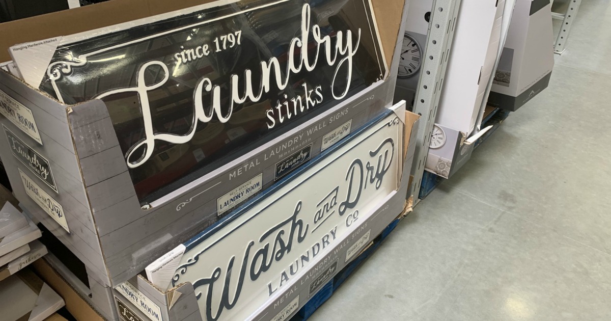 metal laundry signs on display at sam's club