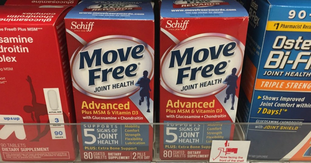 two boxes of Move Free supplements on store shelf next to other joint medicines