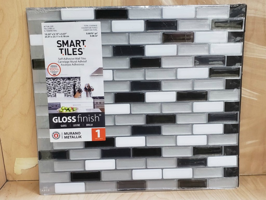 tile leaning against wall with grey and black