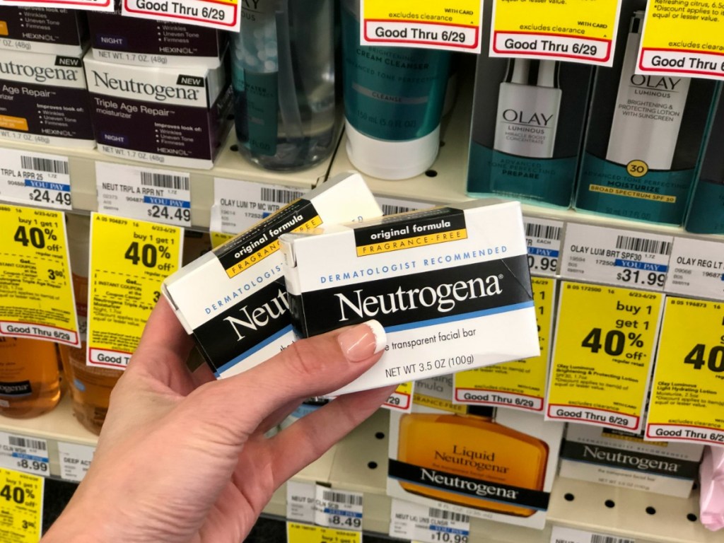 hand holding two neutrogena bars