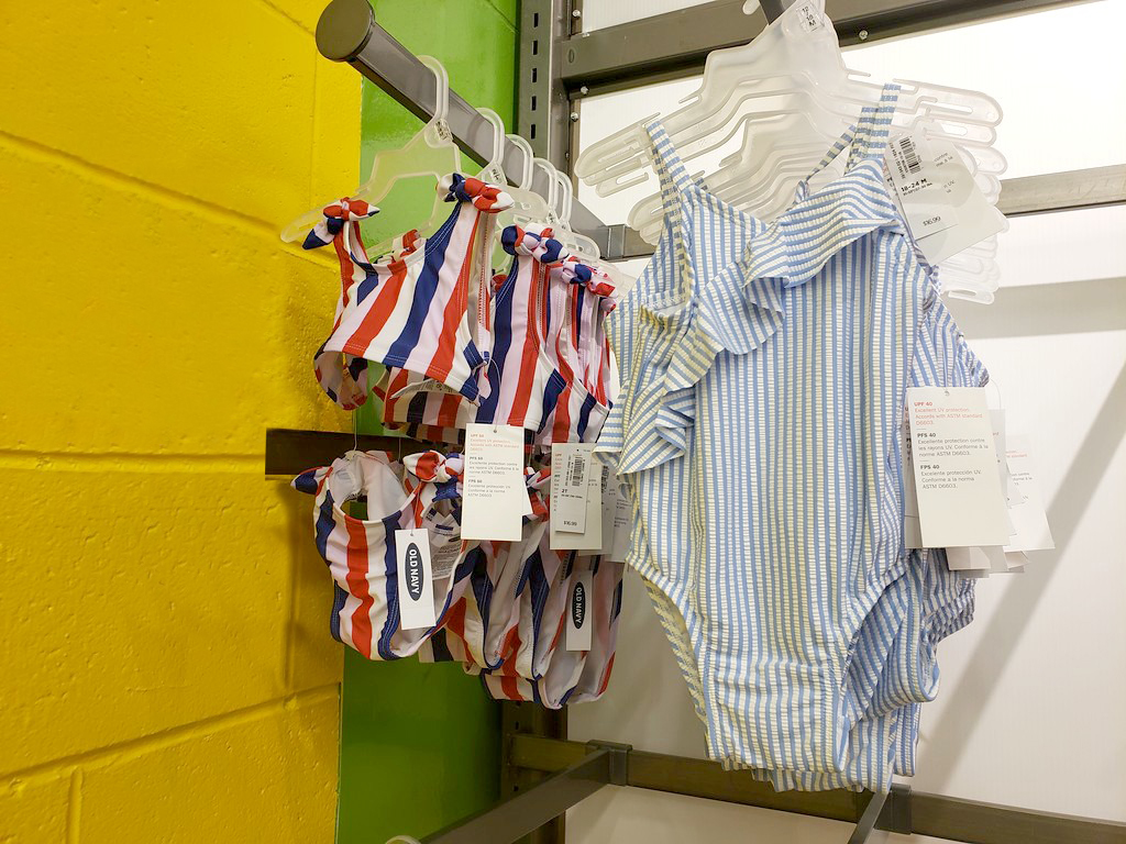 Old Navy Girls Swimwear hanging up in the store