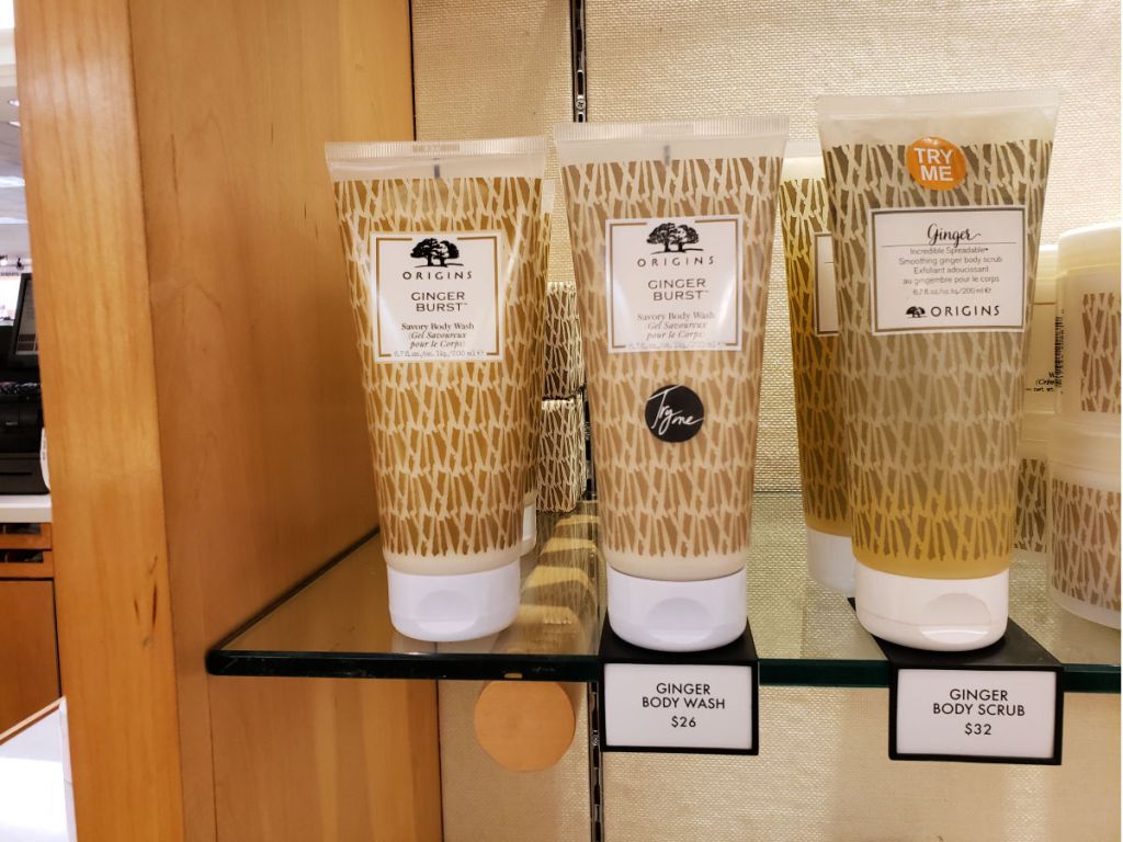 Glass shelf of Origins Ginger Burst Savory Body Wash