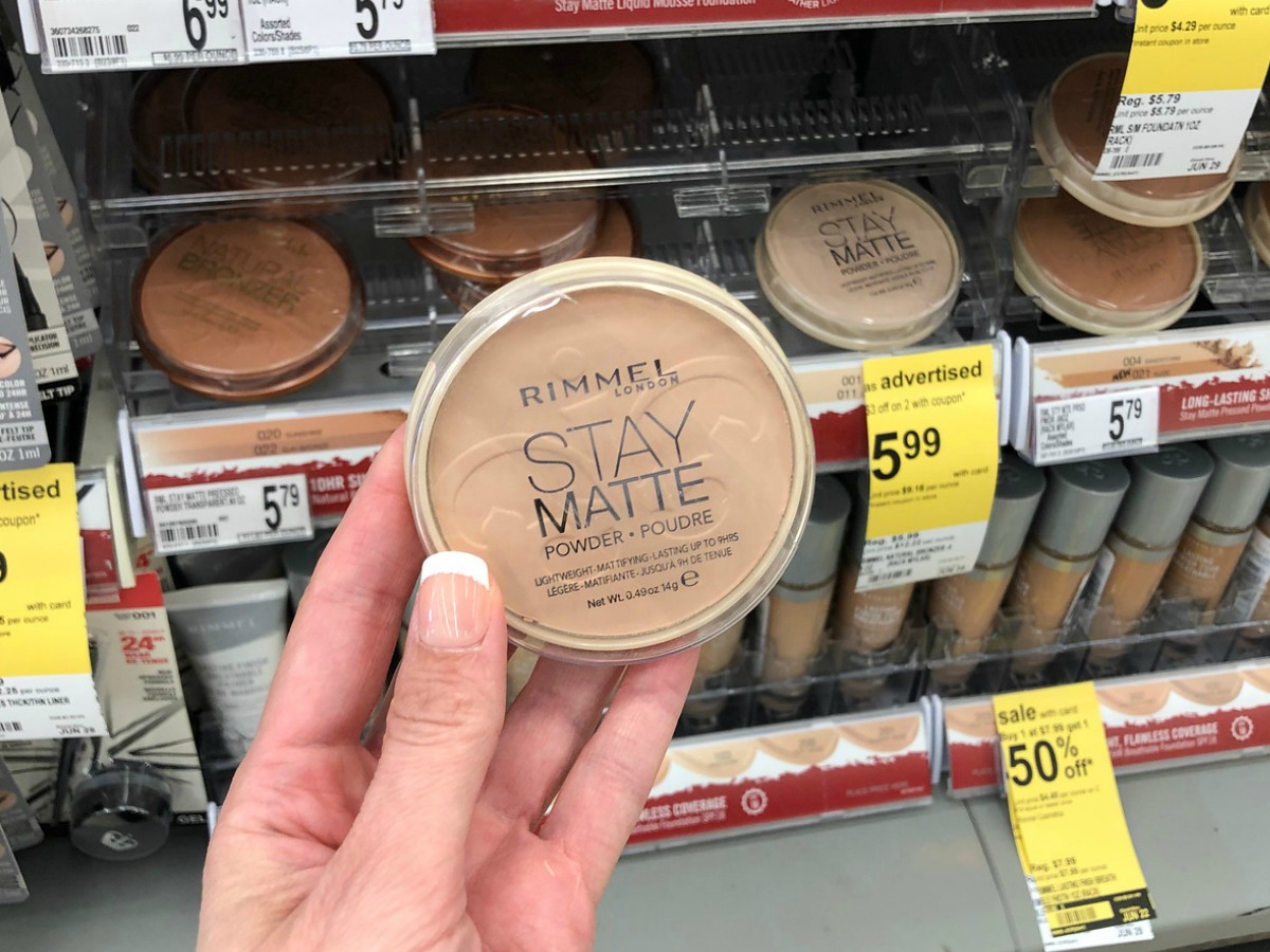 hand holding rimmel stay matte powder