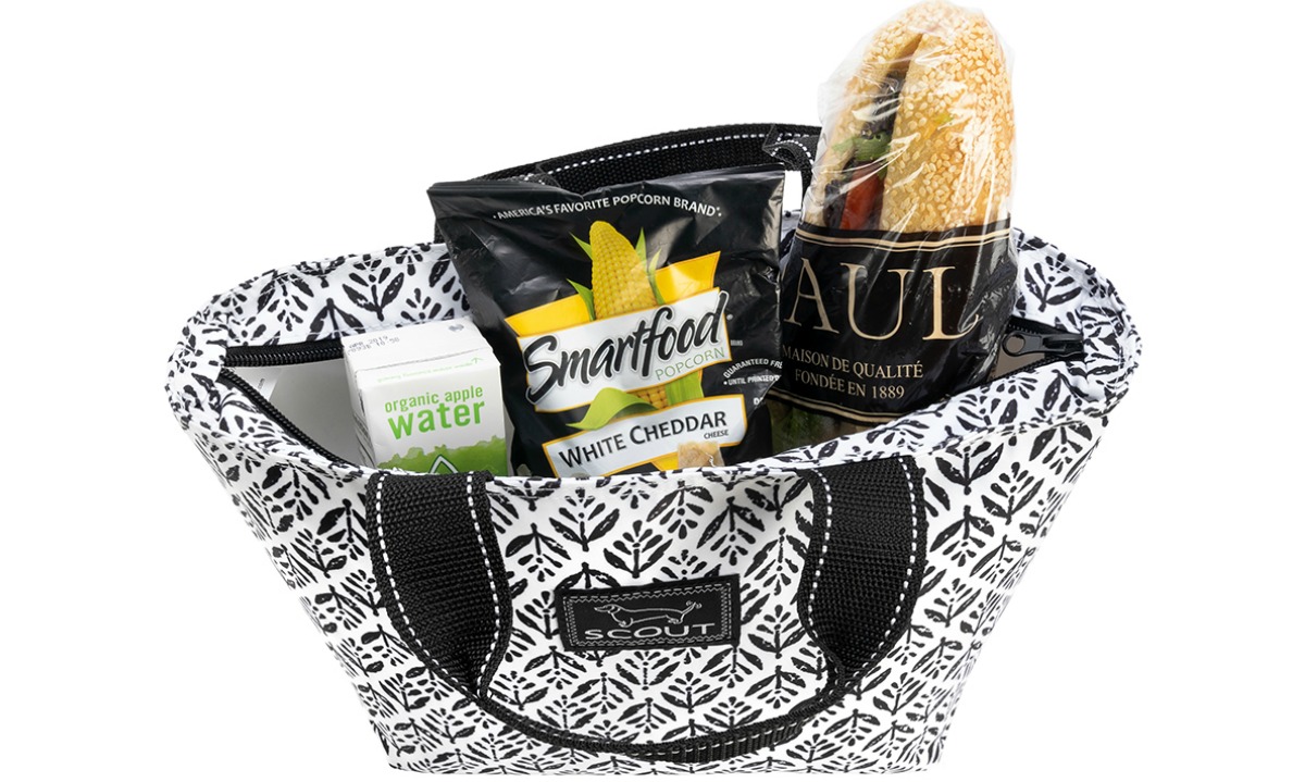 black and white patterned lunch tote filled with snacks