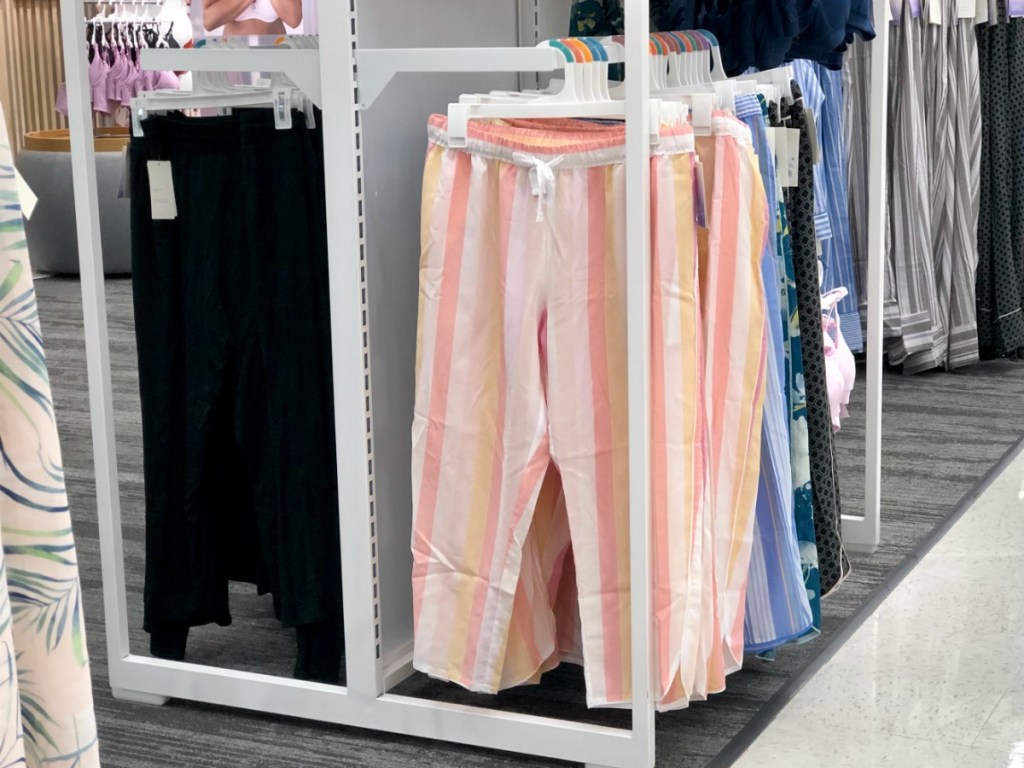 simply cool pajama bottoms hanging on rods at Target