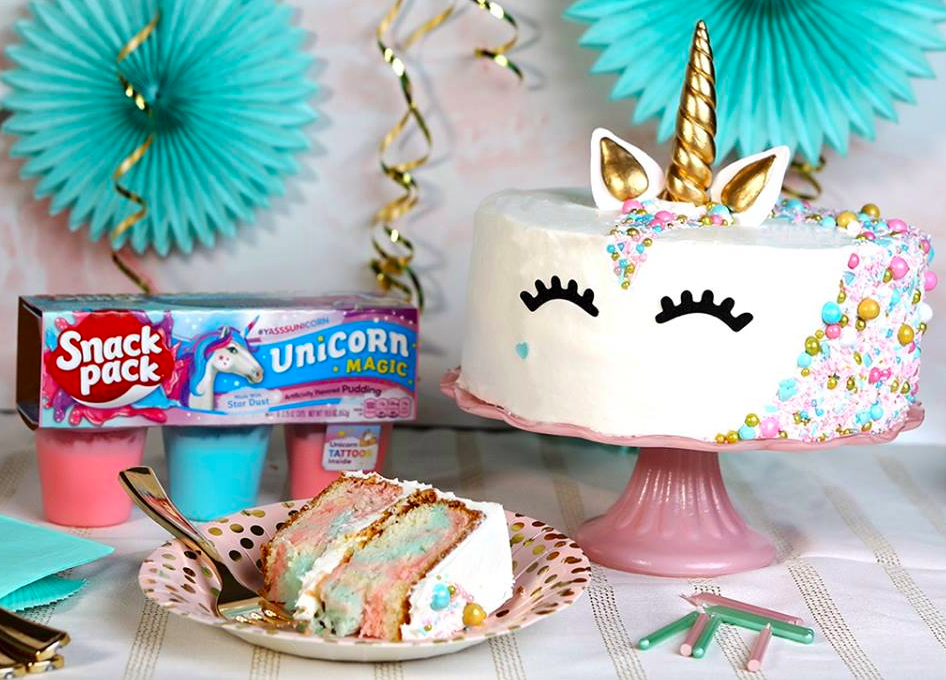 Snack Pack Unicorn Magic Next to Unicorn Birthday Cake & Party Decorations