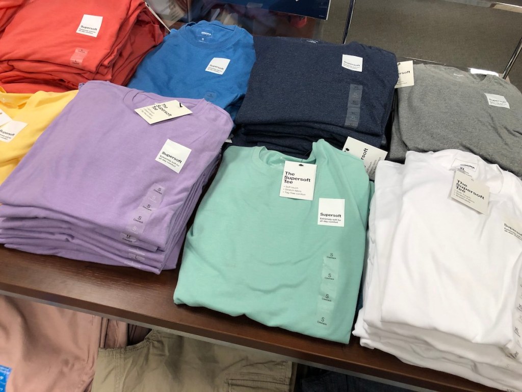 men's t-shirts sitting on table