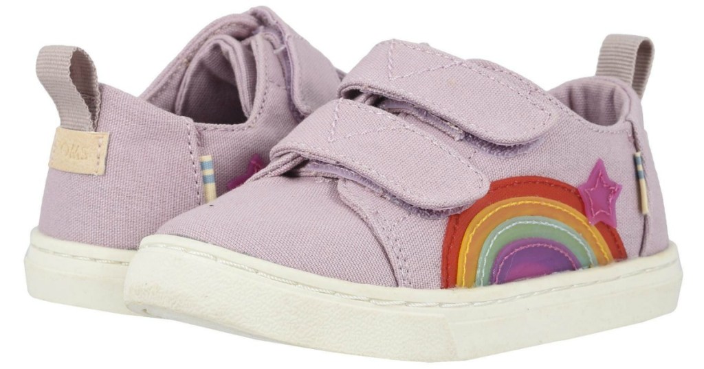 Small Tom's shoes in lilac color with rainbows on the side topped with a star