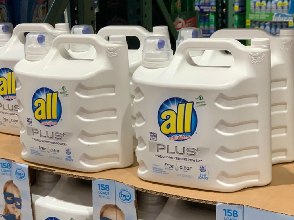 bottles of laundry detergent on store display shelves