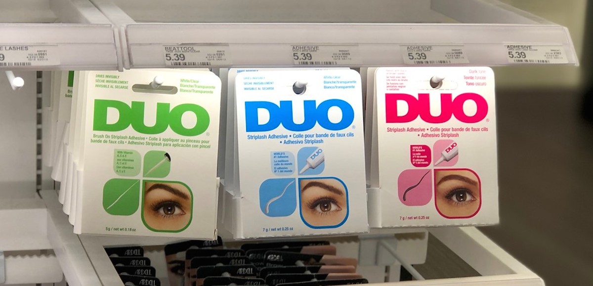 duo eyelash glue lined up on store shelf