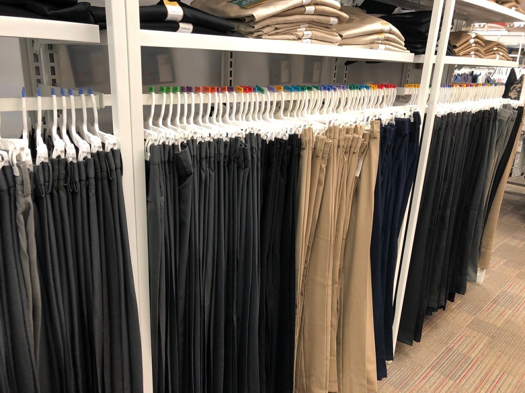 racks with different color men's dress pants.jpg