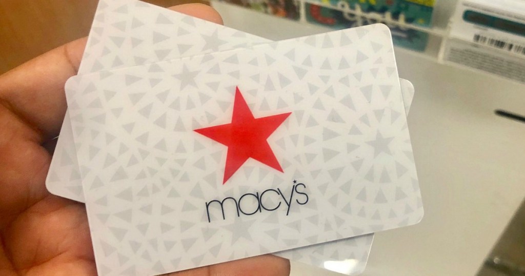 macy's gift card in hand