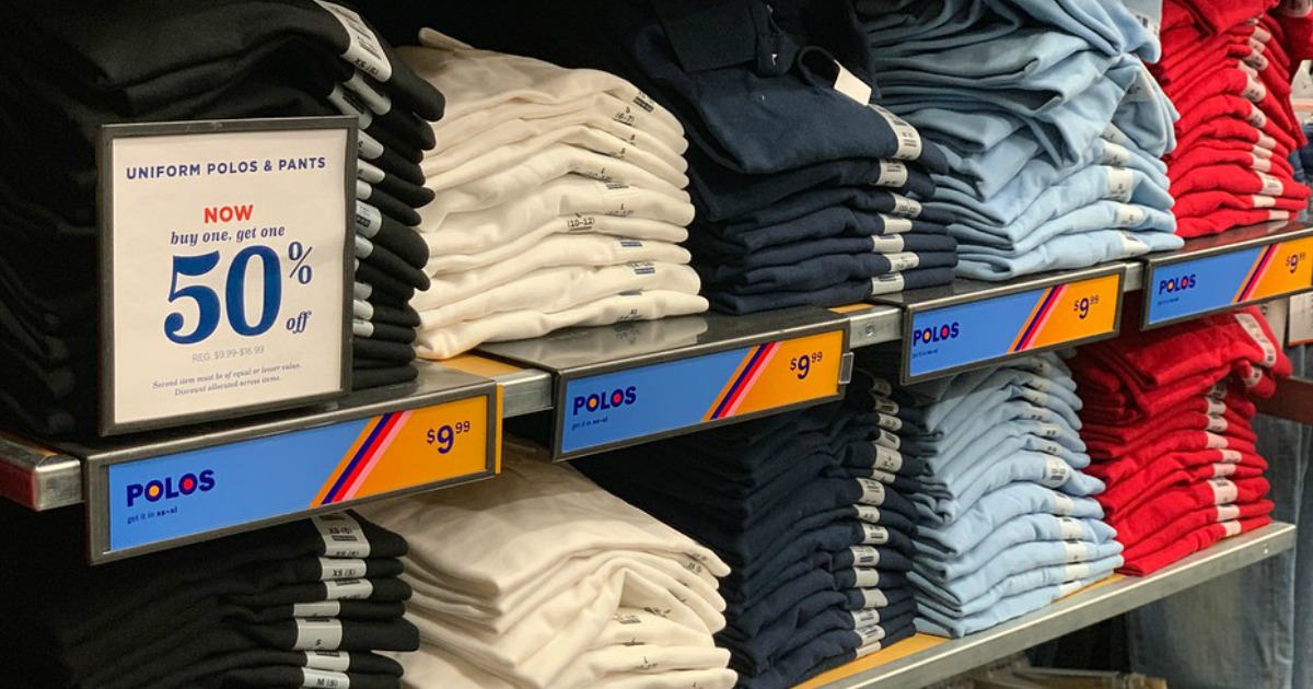 stacks of kids school uniform polo shirts on an old navy shelf