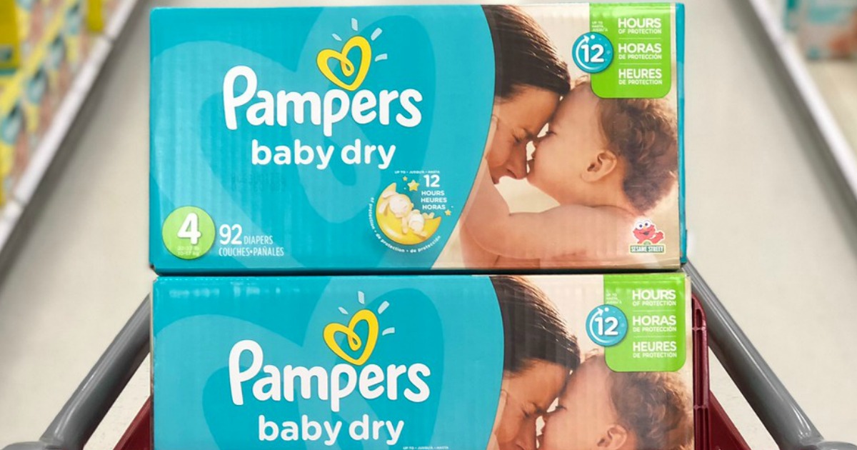 two boxs of pampers baby dry diapers in shopping cat