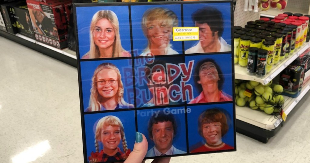 hand holding brady bunch game on clearance at target