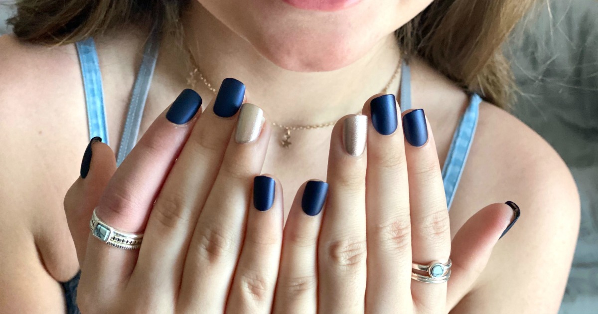 teen with press on Impress Nails 