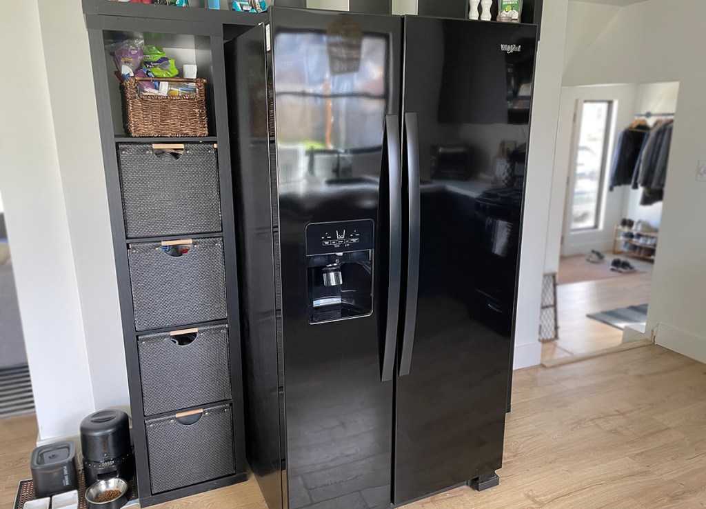 whirlpool side by side fridge in black