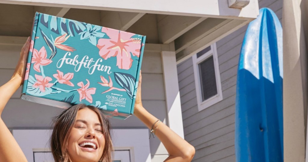 woman holding FabFitFun box