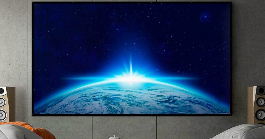 projection screen hanging on a wall