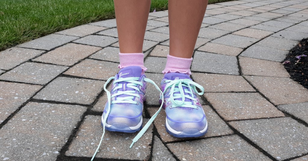 girl with untied shoe