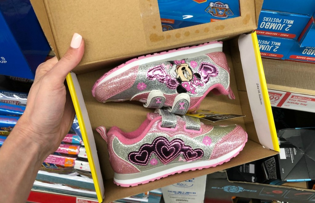 Minnie Mouse-themed kids athletic shoes in box at ALDI store