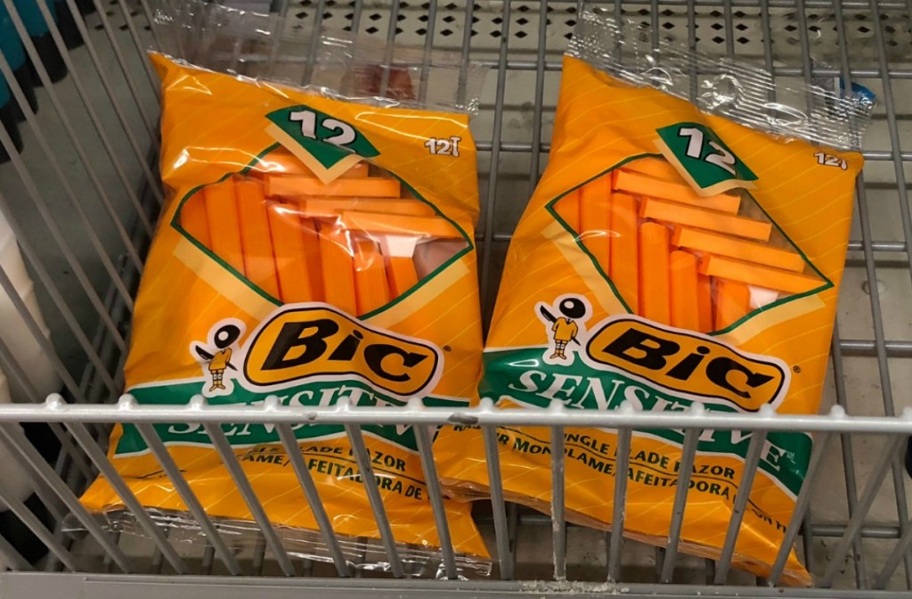 BIC brand men's razors for sensitive skin in orange packaging on store shelf