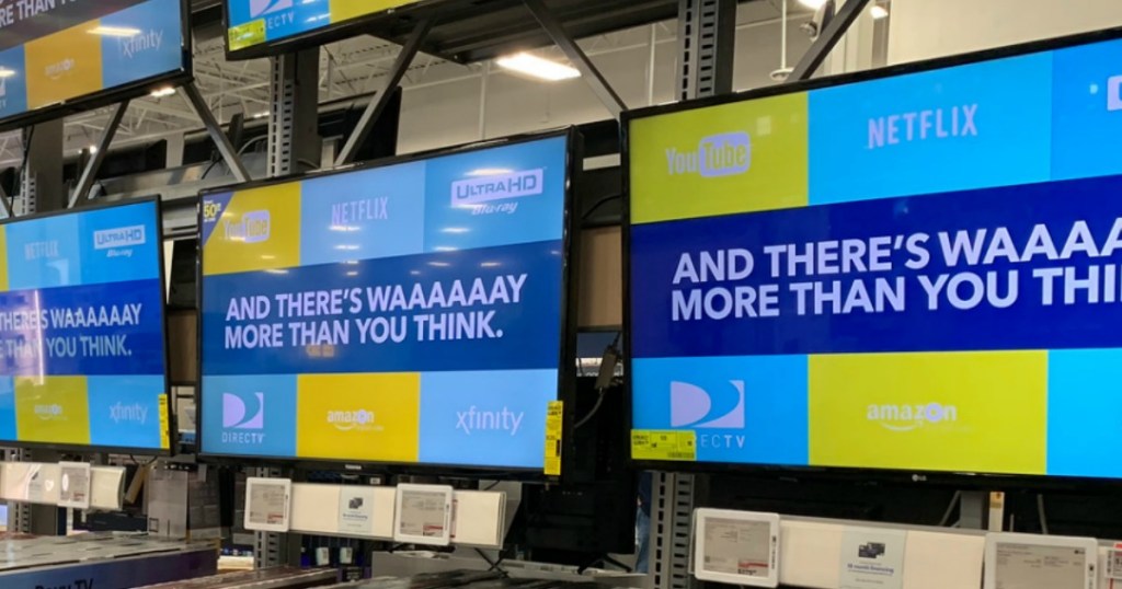 Large TVs on display at Best Buy