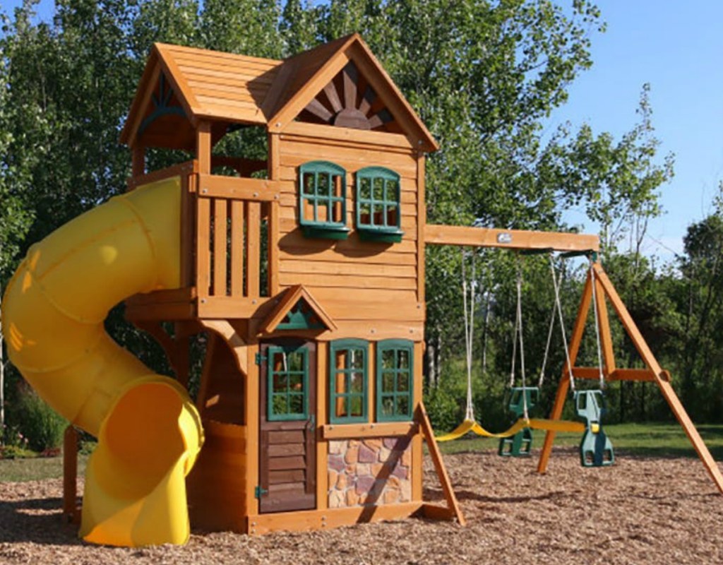 Extra Large wooden playset in backyard