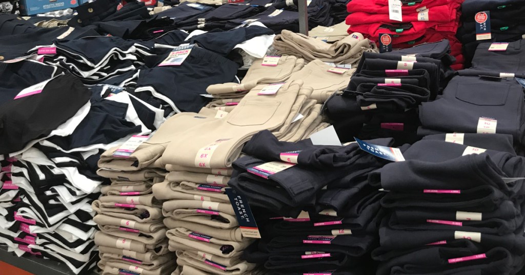 Costco Uniforms stacked on a table