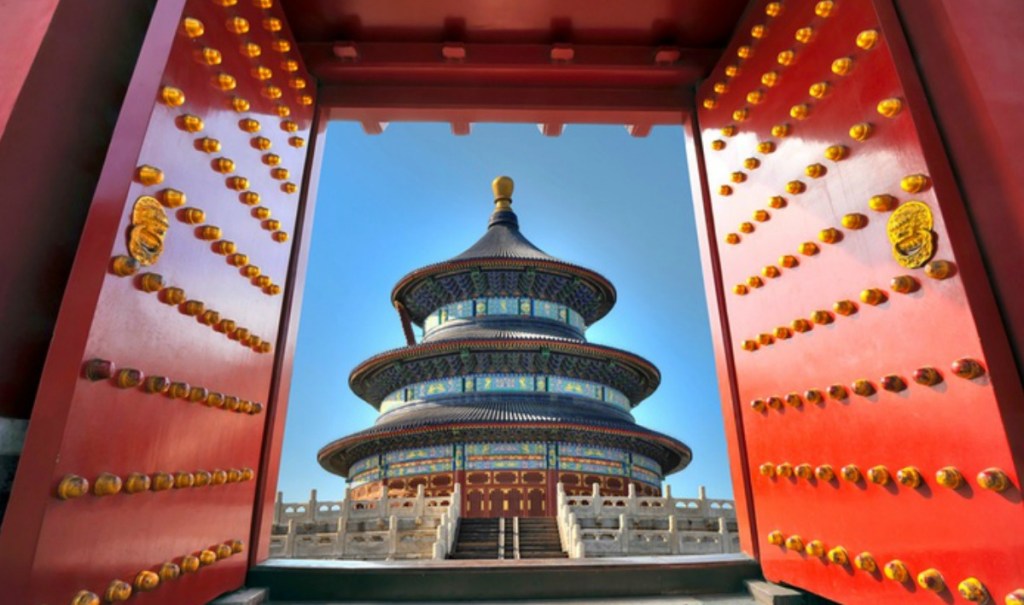 Chinese view through large red doors