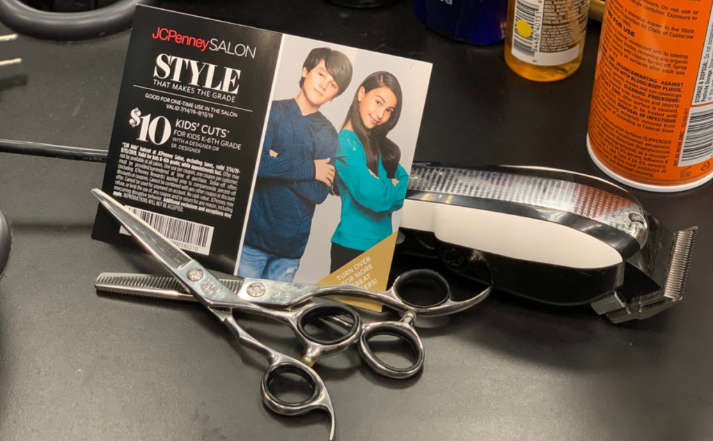 JCPenny Salon Kids' Haircut Coupon with scissors onlineb and clippers on table