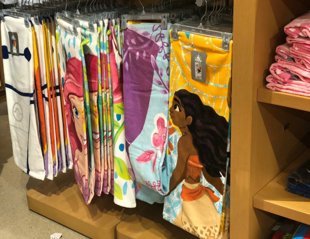 Disney store display of character beach towels