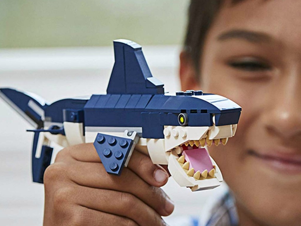 LEGO Creator 3in1 Deep Sea Creatures in child's hand close up