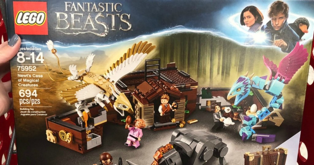 hand holding up lego fantastic beasts box