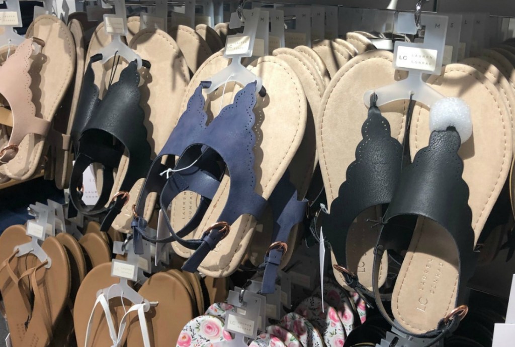 Black and blue women's sandals on display at Kohl's