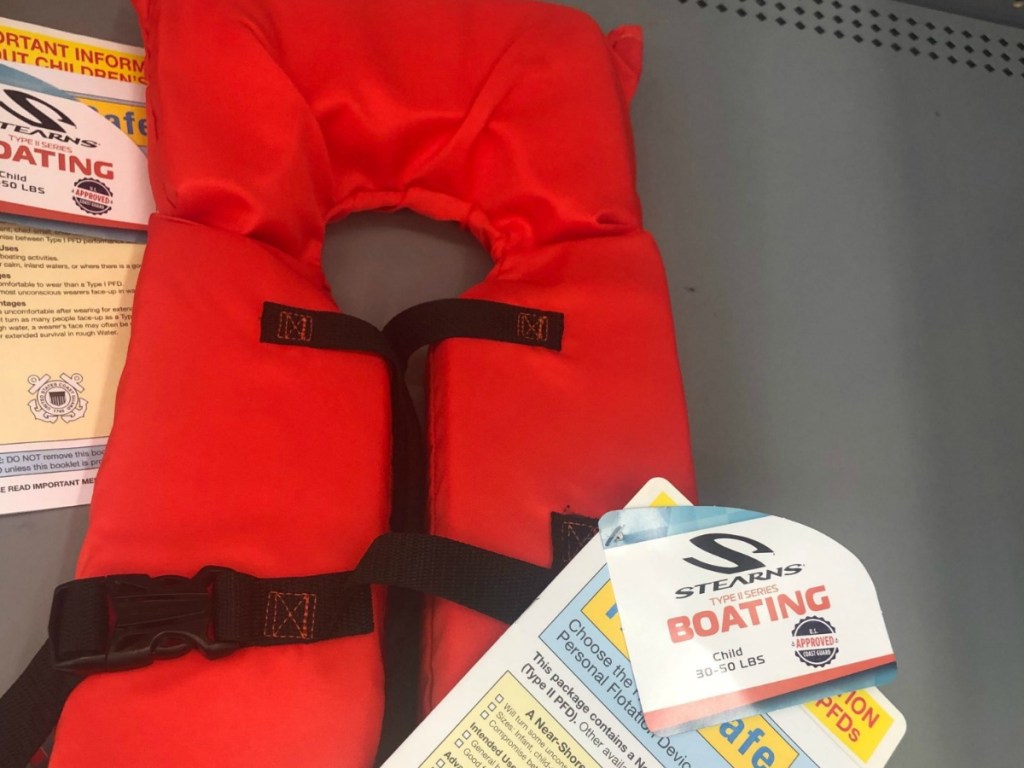 orange life jacket on the shelf at Walmart