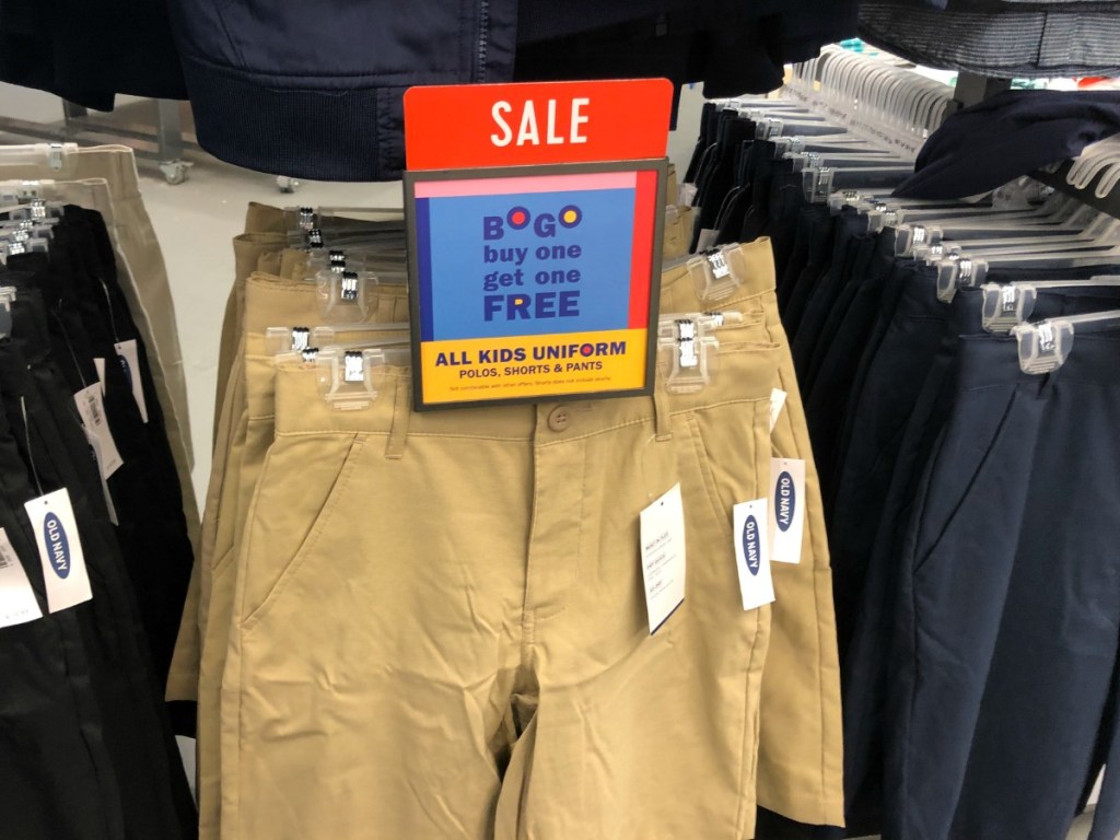 Old Navy Uniform Shorts Hanging on Pegs